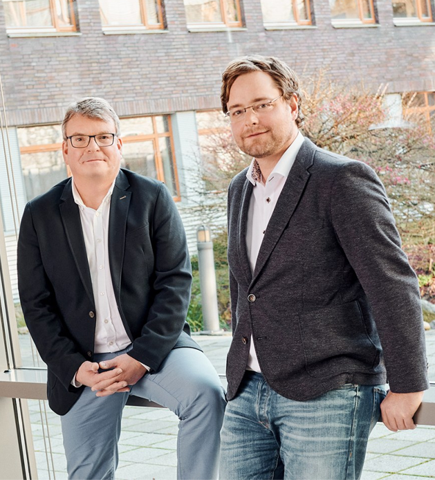 Foto der Geschäftsführer Daniel Migowski und Ingo Kuhlmann